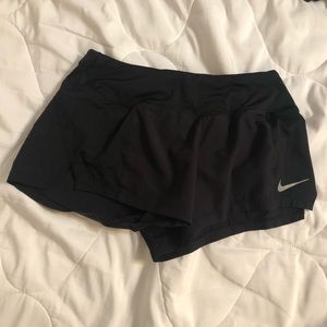 black Nike shorts